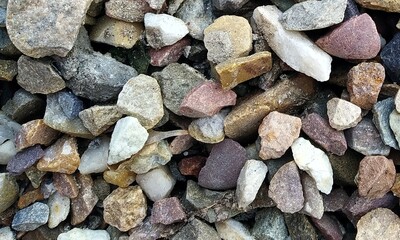 Abstract background with lot of various shape peeble stones. 