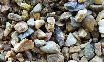 Abstract background with lot of various shape peeble stones. 