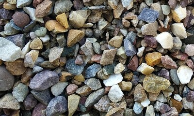 Abstract background with lot of various shape peeble stones. 