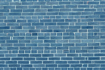 Brick wall with unusual blue bricks