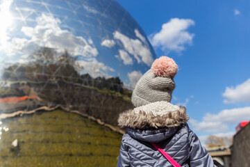 Fragment of the dome of the globe against the blue sky.