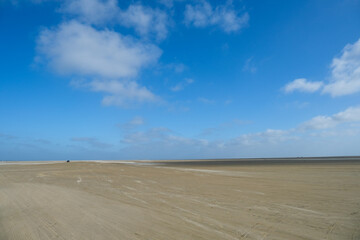 Empty sandy  beach on the north sea, windy weather
