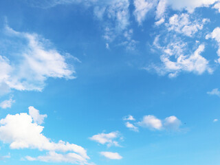 Clean blue sky and white clouds sky background with space for decoration. And used to make wallpaper or bring to work in graphic design.