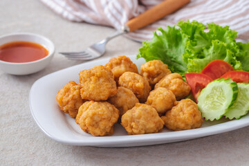 Deep fried shrimp ball and vegetable on plate