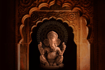 Lord ganesha antique sculpture for ganesha festival. - obrazy, fototapety, plakaty
