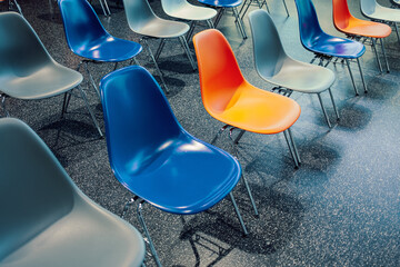 blue and orange chairs in a row