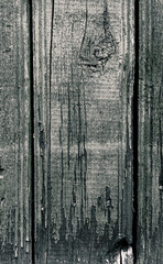 Texture of old wooden grey shabby planks with cracks and stains. Abstract background of wood table top. Vertical strips. Copy space. Aged effect boards. Retro style backdrop. Vintage wallpaper. DIY