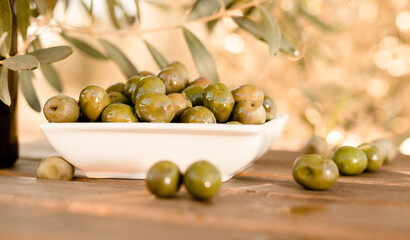 olives on table in an olive grove
