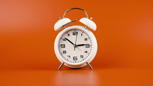 white clock walking slowly on orange background concept of time and work