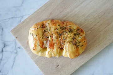 Sausage buns bread. Soft baked bun (dough) stuffed with sausage for fast food breakfast or coffee break. Sausage roll, (hot dog).
With mayo, tomato sauce, mozarella cheese and parsley topping

