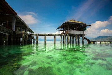 building on a clear sea under a blue sky. Indonesian landscapes tropical beaches.