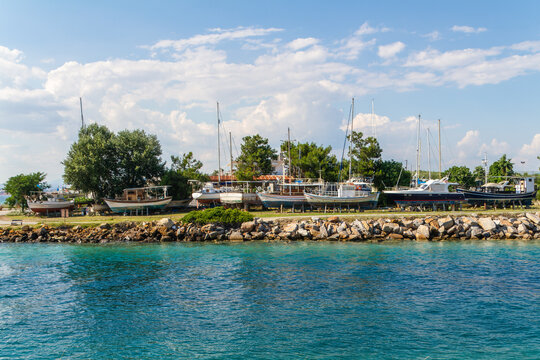 Nea Potidea, Greece, July 10, 2022. Port of the village of Nea Potidea or Nea Poteidea in Kassandra peninsula, Chalkidiki, Greece