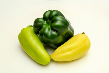 Veggie lifestyle concept, isolated different types of pepper in shades of green