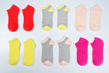 Set of colorful socks on a background