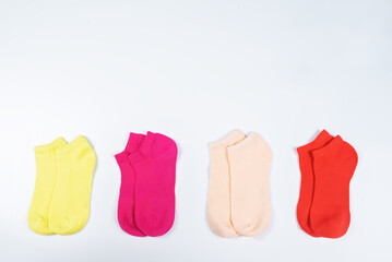 Set of colorful socks on a background