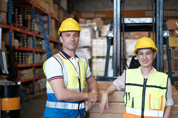 Technical team machine security system learning. Industry worker man standing in factory .Employee warehouse factory operators. women black worker happiness in factory and engineering team.