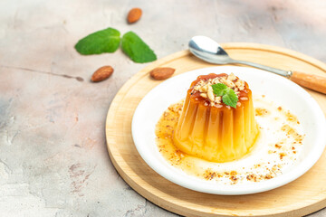 panna cota with caramel. Creme Caramel Dessert on a light background. banner, menu, recipe place for text, top view