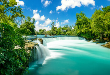 Long exposure wide angle scenic view of Manavgat waterfall in Antalya. Selective focus.