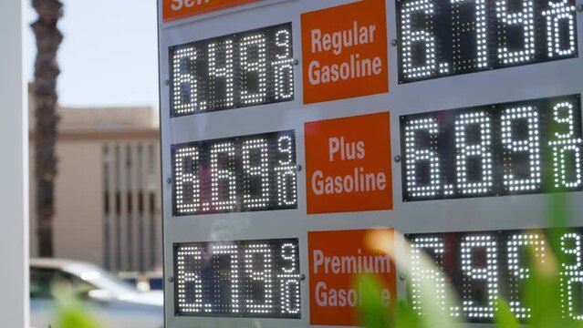 High Gas Prices on a Gas Station Sign in California, Medium Shot $6.49 Regular. Inflation.