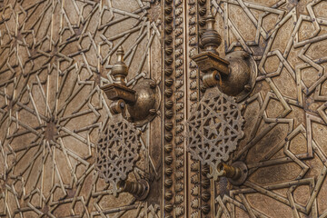 Close up shot of a copper door knockers