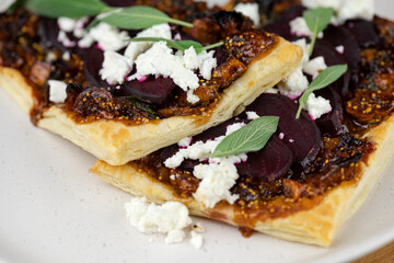 Tartlet with beetroot, fig and feta cheese. Puff Pastry Tart