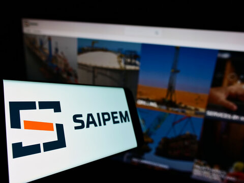 Stuttgart, Germany - 01-09-2022: Smartphone with logo of Italian oilfield services company Saipem S.p.A. on screen in front of business website. Focus on left of phone display.