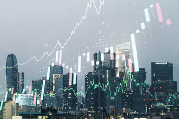 Double exposure of abstract creative financial chart hologram on Los Angeles skyscrapers background, research and strategy concept