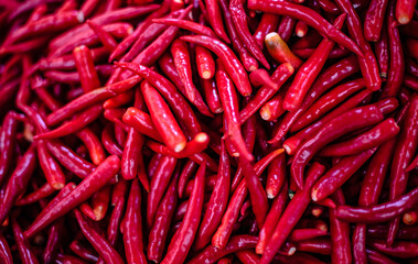 Pickled red chillies piled up for sale in Amorn Nakhon Naklua Fresh Food Market, Thailand.