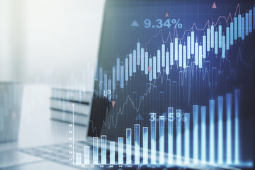 Abstract creative financial graph on modern laptop background, financial and trading concept. Multiexposure
