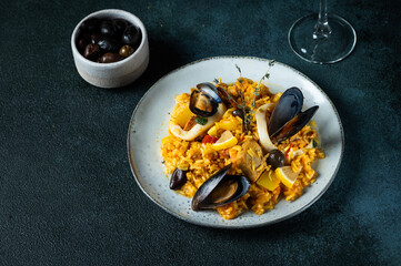 Classic dish of Spain, seafood paella. Spanish paella with shrimps, clamps, mussels. mediterranean cuisine