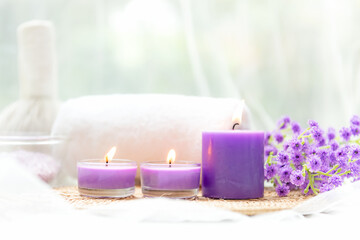Obraz na płótnie Canvas Spa beauty massage health wellness background.  Spa Thai therapy treatment aromatherapy for body woman with purple flower nature candle for relax and summer time