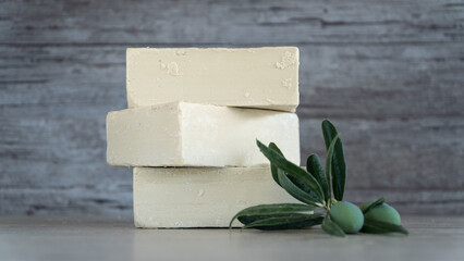 Natural Olive oil soap. Organic handmade soap bars with olive branch concept. Skin care products. Selective focus.