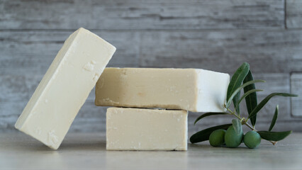 Natural Olive oil soap. Organic handmade soap bars with olive branch concept. Skin care products. Selective focus.