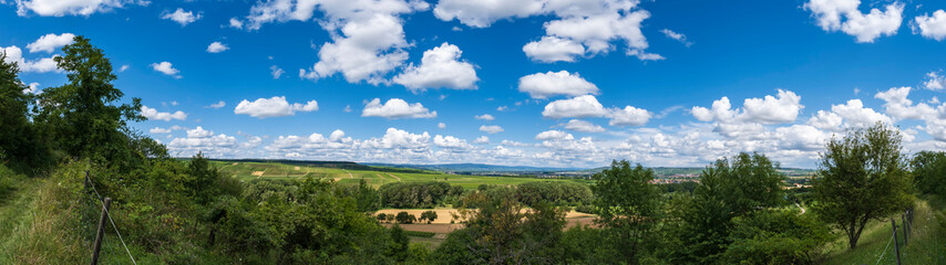 A panoramic shot of the Guldenbach valley near Bretzenheim/Germany under a white-blue sky