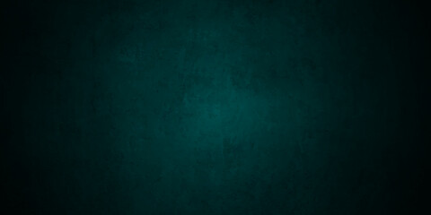 Vintage green stone grunge concrete cement blackboard chalkboard wall floor texture. Black anthracite dark green grunge old texture panorama backdrop background.