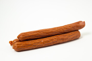 Hunting sausages on a white background. Delicious traditional food