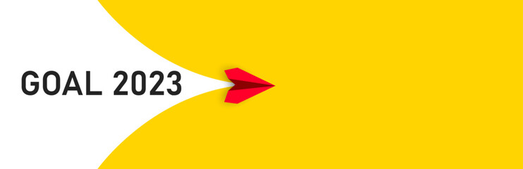 Red airplane unfolds from behind itself Goal 2023 text.Business creativity new idea discovery innovation technology.New year idea concept.