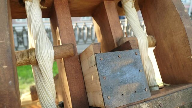 Roman wooden balista on green grass