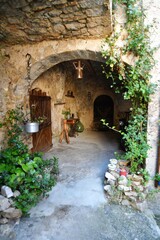 Fototapeta na wymiar The entrance to an ancient house in Pesche, an old village in the Molise region of Italy.
