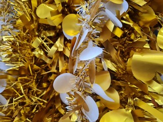 gold ribbon, slinger for christmas tree decoration.  colorful christmas ornaments