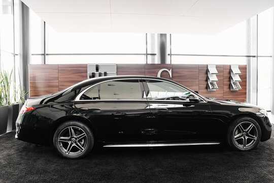 Side View A Black Mercedes Car In The Parking Of A Car Dealership