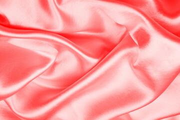 Red silk texture luxurious satin for abstract background, soft focus