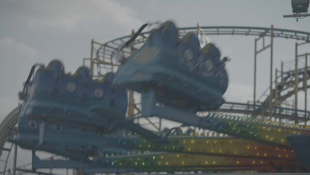 Still shot of fairground ride, boardwalk ride, amusement park