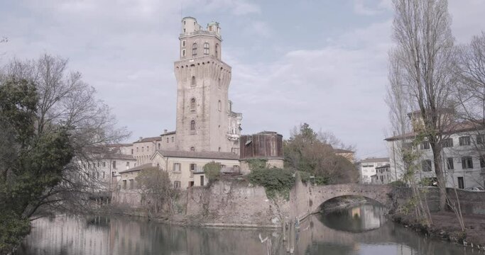 Specola buldings in Padua with a river in front