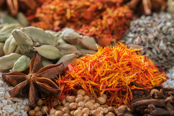 Spices. Aromatic Indian spices on a slate background. Spices and herbs on a stone background....