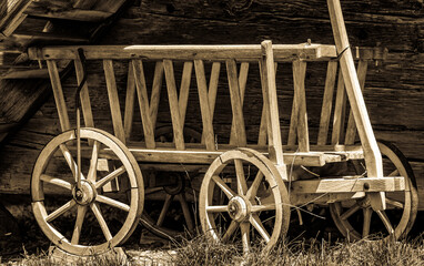 Fototapeta na wymiar old wooden hay trailer - close-up