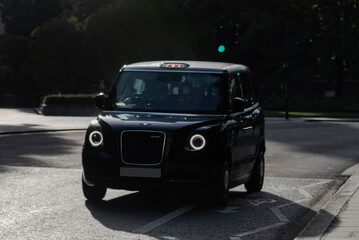London taxi cab on blurry background
