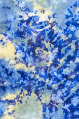 tie dye pattern hand dyed on cotton fabric abstract texture background.