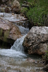 small stream through two stones 