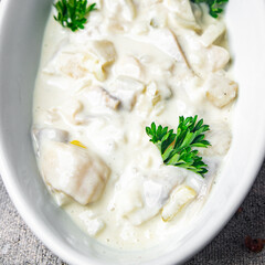 herring sour cream white sauce fresh healthy meal food snack on the table copy space food background